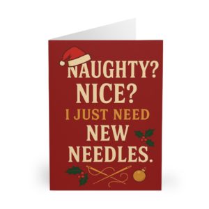 Funny sewing Christmas card with red background, Santa hat, holly, crossed needles and bold text “Naughty? Nice? I Just Need New Needles.” — festive card for sewing lovers | by T Larkin.