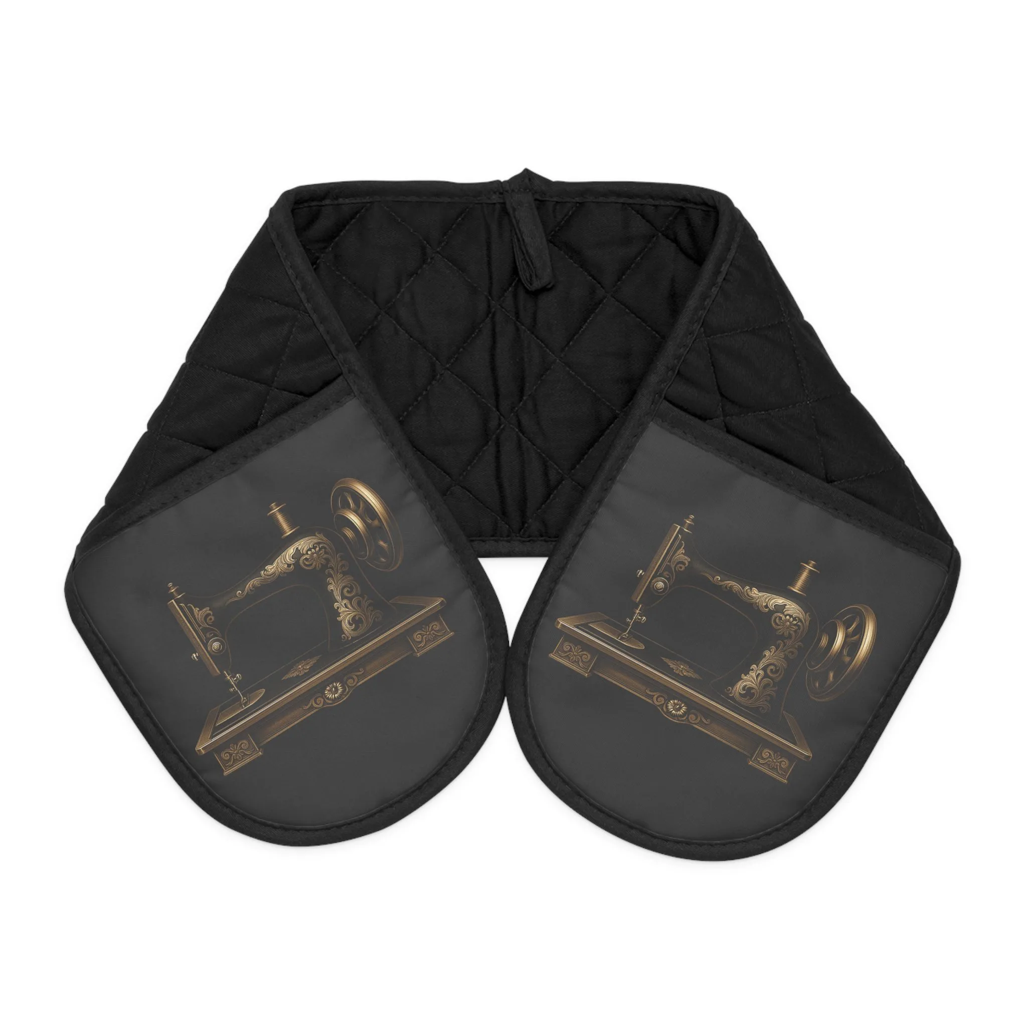 Black sewing oven mitts featuring an ornate gold vintage sewing machine, quilted and heat-resistant, stylish kitchen gift for sewing lovers | by T Larkin.