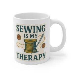 Sewing Is My Therapy sewing mug featuring a spool, needle, and vintage typography – funny gift for sewing lovers | By T Larkin.