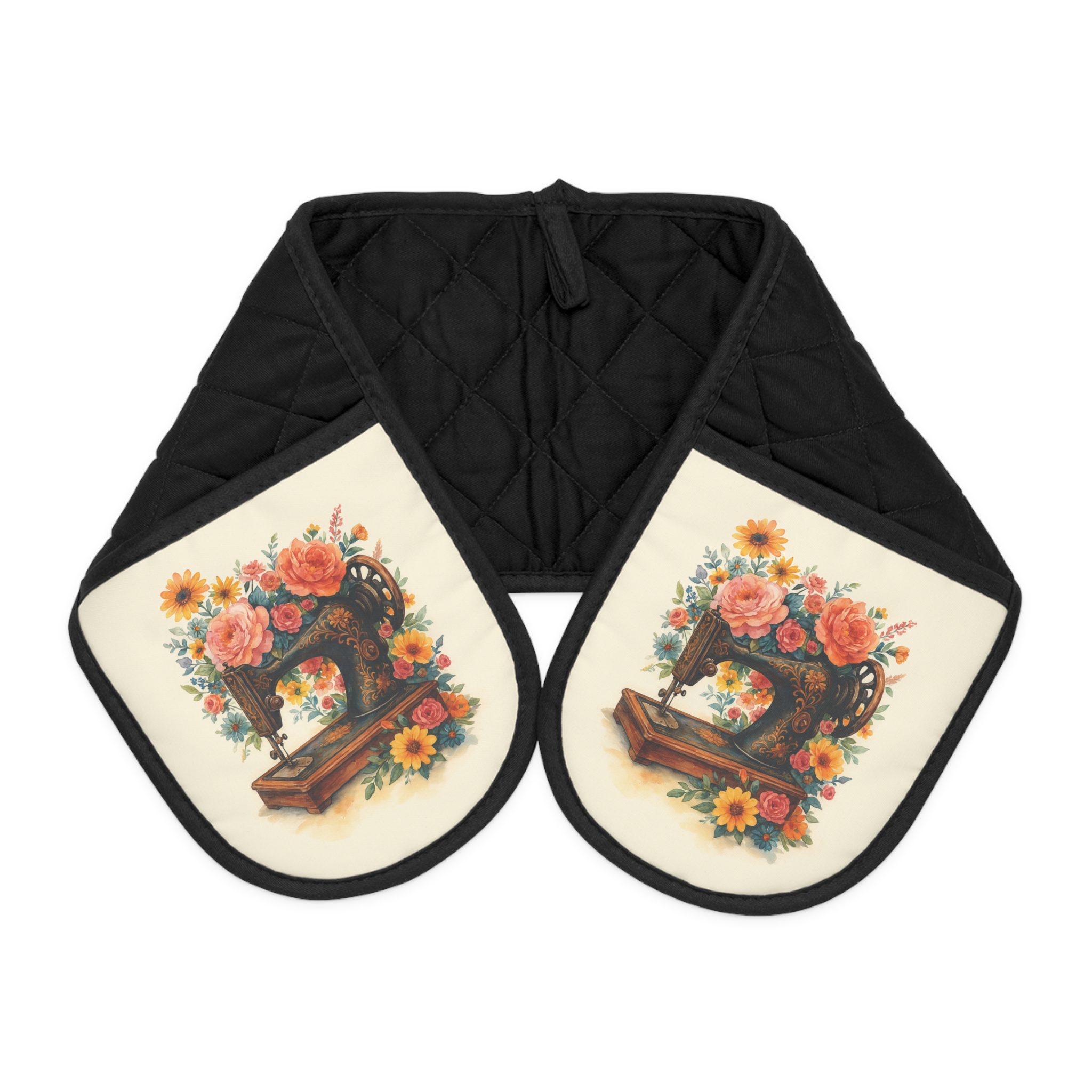 Floral sewing oven mitts featuring a vintage sewing machine surrounded by roses and daisies on a warm cream background, quilted and heat-resistant | by T Larkin.
