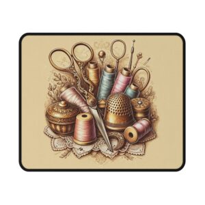 Vintage sewing mouse mat featuring golden scissors, ornate thimbles, pastel spools, and lace details on a warm beige background — classic sewing themed gift | By T Larkin.