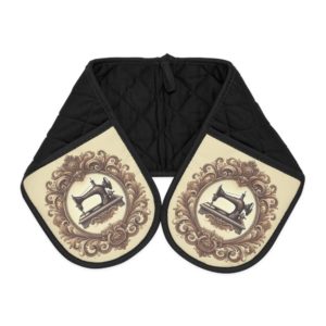Vintage sewing oven mitts with an ornate antique sewing machine design in warm brown tones, quilting-style padded construction — perfect kitchen gift for sewing lovers | by T Larkin.